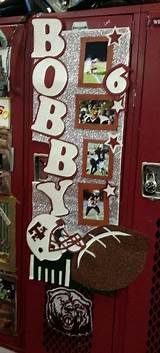 a refrigerator covered in pictures and magnets with the word boobob on it