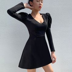 Material: Polyester Material: Spandex Model Number: 93507 Decoration: Draped Season: Autumn Waistline: Natural Style: Sexy & Club Silhouette: A-Line Sleeve Length(cm): Full Pattern Type: Solid Gender: Women Neckline: V-Neck Sleeve Style: Puff Sleeve Dresses Length: Above Knee, Mini color: Black style: Fashion,Sexy,Elegant Gender: Women Season: Autumn,Winter Elastic: Medium Black Style Fashion, Party Dresses Black, Spandex Dress, Puff Sleeve Dresses, Sleeve Fashion, Puffed Sleeves Dress, Sleeve Dresses, Natural Style, Dresses Black