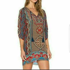 Price Firm Time To Get 'Festival' Ready With This Awesome Hippie Boho Chic Ethnic Mini Dress With 3/4 Sleeves And Tassel At Neckline. Measured Laying Flat Small Bust 18.5" Length 32" Large Bust 20.5" Length 32" 87% Cotton, 13% Acetate Has A Satiny Feel. No Stretch. Red V-neck Boho Hippie Dress, Printed Bohemian Tunic Boho Dress, Multicolor Bohemian Boho Dress With Paisley Print, Bohemian V-neck Mini Dress With Vibrant Print, Multicolor Bohemian Dress With Paisley Print, Bohemian Mini Dress With Vibrant Print, Bohemian Mini Dress With Colorful Pattern, Bohemian Mini Dress With Vibrant Print For Beach, Casual Printed Boho Dress For Festival