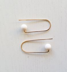 CURVE_W | white earrings, gold earrings, loop earrings, minimalist, modern jewelry, shpere earrings, Minimalist White Hoop Earrings For Everyday, Minimalist White Jewelry For Pierced Ears, Minimalist White Jewelry With Matching Earrings, White Minimalist Round Hoop Earrings, Minimalist 14k Gold Filled Circle Earrings, Minimalist White Round Hoop Earrings, Modern White Brass Jewelry, Minimalist Round Linear Earrings For Everyday, Minimalist White Brass Jewelry