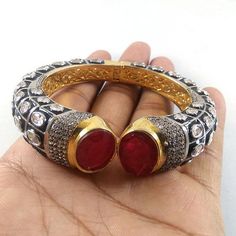 This Listing is for 1 Piece Beautiful Red Garnet & CZ Hydro Gemstone 24k Gold Plated Cuff Bangle Bracelet Jewelry Gemstone: Red Garnet & CZ Metal : Brass Style : Cuff Bracelet Size : Cuff Adjustable Size Plating : 24k Gold Plated & Black Oxidize Color : Yellow,White, Black Note : We Ship Parcel Via India Post Economy Shipping It's Take 20 To 25 Days To Arrive. Check my other items frequently. I will be adding to the inventory regularly. Be sure to visit my shop to check for any coupo Unique Red Bangle Jewelry, Red Ruby Bangle As Gift, Red Jeweled Bracelets As Gift, Red Jeweled Bracelets For Gift, Red Jeweled Bangle As A Gift, Red Ruby Bracelet For Festive Occasions, Red Jeweled Bangle For Gift, Festive Red Ruby Bracelet, Red Gemstone Bangle Cuff Bracelet