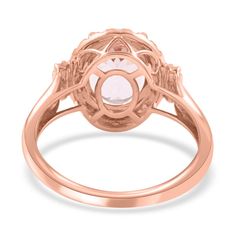 an 18k rose gold ring with a white topazte stone in the center