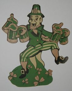 a paper cutout of a leprechaun holding two beer mugs