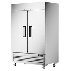 a stainless steel refrigerator with two doors and wheels on the bottom, in front of a white background