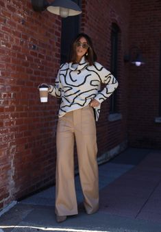 Our Oversized Abstract Sweater is the perfect blend of comfort and style. Crafted with a soft, stretchy knit and an abstract, patterned finish, this turtleneck sweater is not only unique, but provides a relaxed fit perfect for any brunch date, dinner out, or drinks with your closest friends. Trendy, versatile, and chic, you can dress it up or down, for a work look or for a casual outing. This sweater also makes a great statement piece for any wardrobe. Fabric 77% Acrylic, 22% Polyester, 4% Spand Oversized Trendy Sweater For Workwear, Casual Beige Turtleneck For Fall, Oversized Beige Casual Turtleneck, Casual Oversized Beige Turtleneck, Oversized Funnel Neck Turtleneck For Work, Trendy Oversized Soft Knit Turtleneck, Chic Oversized Turtleneck Sweater, Trendy Oversized Turtleneck With High Neck, Trendy Oversized Knit Turtleneck