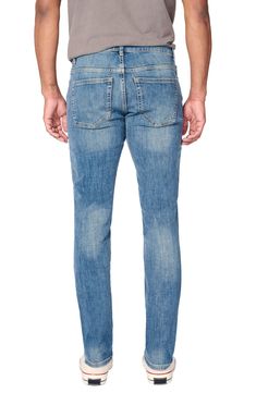 A distressed medium wash renders a laid-back vibe in a pair of slim-fit jeans that effortlessly retain their shape while also offering stretch. Zip fly with button closure Five-pocket style 92% cotton, 7% polyester, 1% Lycra® spandex Machine wash, dry flat Imported Distressed Fitted Medium Wash Jeans, Distressed Fitted Jeans In Medium Wash, Slim Fit Medium Wash Jeans, Medium Wash Slim Fit Jeans, Slim Medium Wash Jeans With Five Pockets, Medium Wash Slim Jeans With Five Pockets, Light Wash Fitted Jeans, Casual Slim Fit Medium Wash Jeans, Casual Slim Medium Wash Jeans