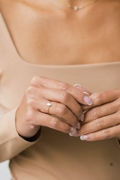 A small, delicate Gold Small Oval Pearl Ring is a delightful, feminine choice. Crafted from eco-friendly recycled gold and a sustainable gemstone, it is the perfect accessory to pair with any Sara Patino Jewelry look. The soft and luminous white pearl offers a timeless beauty that is both classic and modern. Recycled 14k gold filled Mother of Pearl is 6mm x 4mm Simple Pearl Ring As A Gift, Minimalist Oval Yellow Gold Pearl Ring, Delicate Everyday Moonstone Ring, Gold Minimalist Oval Pearl Ring, Minimalist Gold Oval Pearl Ring, Delicate Everyday Pearl Ring, Dainty White Opal Ring For Everyday, Minimalist Teardrop Ring For Everyday, Simple Oval Wedding Jewelry