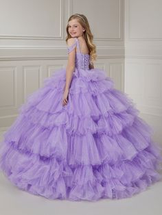 Your sweet girl will light up the room in this beaded long cold shoulder dress with A-line ruffled tulle skirt by Tiffany Princess 13716. This cold shoulder gown features a square neckline with beaded embellishments, floor length A-line sparkle tulle skirt with ruffles, sweep train, and a lace-up back. House of Wu Tiffany Princess Collection Fall 2023 Style Number: 13716 Fabric: Beading/Sparkle Tulle Please note: There may be a loss of glitter while wearing this dress due to the nature of the fa Princess Dresses Kids Ball Gowns, Fabric Beading, Kid Dresses, Princess Dresses Kids, Kids Prom Dresses, Grammar Notes, Back House, Birthday Princess Dress