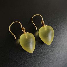 These stunning earrings are set in 14K Solid Yellow Gold with Natural Yellow Quartz with utmost precision. It is an unique gemstone earring pair for nearly every occasion and is completely hassle-free jewelry. 🔷 ABOUT GEMSTONE: Yellow Quartz is a radiant gemstone, celebrated for its bright, sunny yellow hue that symbolizes joy, optimism, and abundance. Known for its uplifting energy, Yellow Quartz is believed to inspire creativity, clarity of thought, and a positive outlook on life, making it a Teardrop Gemstone Earrings In Yellow Gold, Yellow Briolette Earrings For Formal Occasions, Fine Jewelry Briolette Earrings As Gift, Handmade Briolette Yellow Gold Earrings, Handmade Yellow Gold Briolette Earrings, 14k Gold Briolette Earrings Gift, Pear-shaped Earrings With Ear Wire For Formal Occasions, Handmade Briolette Earrings For Formal Occasions, Pear-shaped 14k Gold Gemstone Earrings