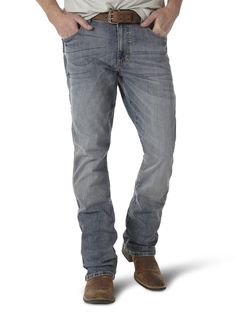 PRICES MAY VARY. SLIM FIT. This slim boot cut jean is designed with fashion-forward style. Built with a slim fit through the seat and thigh, our Retro jean sits lower on the waist and leaves enough room to fit over your favorite pair of boots. RETRO STYLING. Designed with Retro style in mind, this boot cut jean provides a vintage look for the modern man. Complete with our signature Retro finishes and slim fit, this jean will keep you looking good for any occasion. QUALITY MATERIALS. Made from hi Best Bootcut Jeans, Mens Jeans Fit, Slim Bootcut Jeans, Mens Bootcut Jeans, Retro Jeans, Bootcut Jean, Wrangler Jeans, Retro Stil, Leather Patches