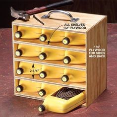 a wooden box filled with lots of yellow items