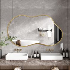 a bathroom with two sinks and a large mirror