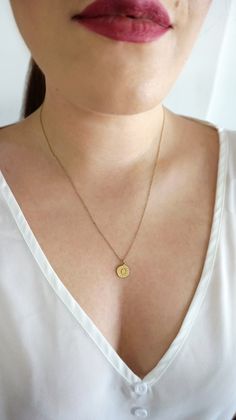 12mm 14K Delicate Sun and Moon Necklace, Layering Solid Gold Necklace, Dainty sun and moon necklace, Gold Disc Necklace, Minimalist necklace, 9K gold sun and moon necklace, FREE EXPRESS SHIPPING Beautiful and delicate necklace with a disc charm engraved with a crescent moon and sun rays, made in 14K or 9K solid gold. She's Like the Sun and the Moon Because even on the cloudiest of days... And darkest of nights... She still find the way to shine bright! Whisper...Shine Bright! ------------------- Everyday Round Charm Necklace With Moon Phase, Minimalist Yellow Gold Coin Necklace With Initial Pendant, Minimalist Yellow Gold Initial Pendant Coin Necklace, Everyday Necklace With Sun And Moon Round Pendant, Everyday Necklaces With Sun And Moon Round Pendant, Minimalist Everyday Jewelry With Sun And Moon Design, Everyday Sun And Moon Design Round Pendant Necklaces, Everyday Yellow Gold Moon Phase Necklace, Everyday Sun And Moon Round Pendant Necklace