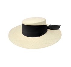 Elegant Flat Brim Sun Hat For Travel, Elegant Flat Brim Toquilla Straw Hat, Elegant Natural Panama Fedora Hat, Elegant Natural Panama Hat In Fedora Style, Elegant Wide Brim Boater Hat For Travel, Elegant Toquilla Straw Sun Hat With Curved Brim, Elegant Straw Hat With Curved Brim For Travel, Elegant Sun Hat With Curved Brim In Toquilla Straw, Elegant Boater Hat With Curved Brim In Toquilla Straw