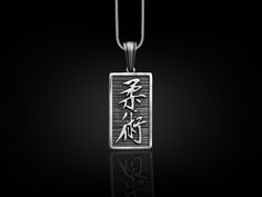 Kanji japanese pendant necklace with custom name,  Silver necklace for men, Engraved necklace for everday These 925K Sterling Silver Kanji Japanesse Necklace has special handmade engraving details which photos are taken with original products. It's very elegant and classy for everyday use and gives stylish look to your outfits. Also, can be preferred as a gift for friends and family for an eternal memorial. Dream collection has many meanings behind its background; we prepare this gift selection Silver Engraved Pendant Necklace, Silver Symbolic Jewelry With Engraved Text, Silver Necklace With Engraved Rectangular Pendant, Symbolic Engraved Rectangular Pendant Necklaces, Silver Pendant Necklace With Engraved Text, Symbolic Square Pendant Necklace With Engraving, Symbolic Silver Necklace With Laser Engraving, Symbolic Engraved Rectangular Pendant Necklace, Sterling Silver Pendant Necklace With Engraved Text