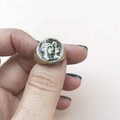 "Gold or silver signet ring, Antique style ring, Unisex Ring, Unique signet ring Basic goes-with-anything signet ring. This ring has a round shape with unique men and women in raw textured which adds lots of character and a \"handmade look\". A unique minimalist ring that will look great with any outfit you'll wear and add BLING to your look. It is light and comfortable to wear, perfect for everyday use. Must-have necklace for any style! Material: ♦ 24K Gold plated brass, nickel-free // Sterling Symbolic Round Hand Cast Signet Ring, Antique Hand Cast Signet Ring For Gift, Antique Hand-cast Signet Ring For Gift, Vintage Hand Cast Round Signet Ring, Vintage Hand-cast Round Signet Ring, Oxidized Open Signet Ring Gift, Oxidized Finish Open Signet Ring, Unique Hand Cast Round Signet Ring, Handmade Brass Open Signet Ring