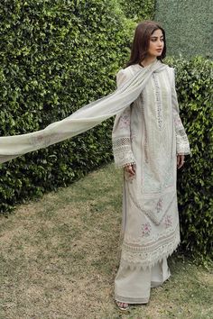 Brand: QalamkarProduct Code: PS-11 RINNAHCollection: Qalamkar Unstitched Festive Lawn CollectionFabric: Lawn DESIGN DETAILS: Shirt Laser Cut Embroidered (Front Center Panel) Chikan kari Embroidered (Front Side Panels) Embroidered hem (Front Center) Embroidered Front Neckline Embroidered Border (Front, Back & Sleeves) Embroidered Lace (Front ,Back & Sleeves) Embroidered Patch (Front & Back) Chikan kari Embroidered Back Chikan kari Embroidered Sleeves Embroidered Border (Sleeves) Dupatta Digital Printed Silk Dupatta Trouser Plain Trosuer Fabric Details Shirt : Lawn Dupatta :Silk Trouser : Cotton DISCLAIMER:* Lining, Laces, and Tassels are not included in unstitched variants.* Embellishment items in stitched outfits are subject to market availability.* The actual colors of the outfit may vary Eid Cambric Lawn Suit With Intricate Embroidery, Semi-stitched Embroidered Lawn Suit, Eid Lawn Suit With Intricate Embroidery, Semi-stitched White Unstitched Suit With Naqshi, Straight Kurta Lawn Suit With Intricate Embroidery In Cambric, Intricate Embroidered Mulmul Unstitched Suit For Eid, Chikankari Embroidery Jamawar Palazzo Set, Semi-stitched Cambric Dupatta With Intricate Embroidery, Designer Cambric Palazzo Set With Intricate Embroidery