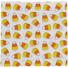 an orange and yellow candy corn pattern on white paper