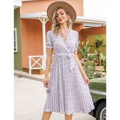 Step into summer with elegance in the WhizMax Women's Floral Wrap V-Neck Midi Dress. This charming dress is perfect for a variety of occasions, from beach outings to weddings, ensuring you look stylish wherever you go.

- Material: Soft, breathable fabric ideal for warm weather
- Features: Wrap V-neck, pleated details, short puff sleeves, elastic high waist, A-line silhouette, elegant hem, and includes a belt
- Color: Purple
- Size: 2XL
- Gender: Female

Designed with a flowy A-line cut and shor Non-stretch Midi Dress For Summer Beach, Non-stretch Midi Dress For Beach In Summer, Non-stretch Knee-length Beach Sundress, Non-stretch Midi Dress For Summer Day Out, Spring Vacation Sundress With Short Sleeves, Vacation V-neck Pleated Midi Dress, Non-stretch Short Sleeve Midi Dress For Summer, Non-stretch Mid-length Summer Dress, Casual Pleated Maxi Dress For Garden Party