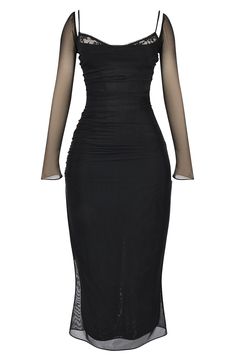 a woman wearing a black dress with sheer sleeves and mesh detailing on the shoulders,