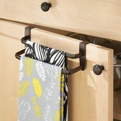 Add storage and functionality to unused space on your cabinet doors with the iDesign Axis Over-The-Cabinet Door Double Dish Towel Bar/Storage Rack. This hanging, over-the-cabinet door towel rack features two towel bars to create additional storage for dish towels, hand towels, pot holders, washcloths, and more, while the non-absorbent foam backing protects your cabinets. Simply hang the metal organizer over the top of the cabinet door for easy installation and set up in the kitchen or bathroom. Cabinet Towel Bar, Bathroom Furniture Storage, Bar Metal, Double Towel Bar, Bar Rack, Inside Cabinets, Bar Storage, Door Organizer, Towel Bars