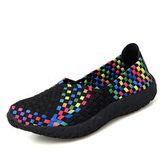 a black shoe with multicolored squares on the side and an eofk logo