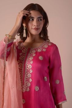 Magenta pink kurta with zari thread, gota patti embroidery. Paired with sharara and contrast peach dupatta. - Aza Fashions Pink Sharara With Dori Work, Transitional Anarkali Style Pink Sharara, Pink Traditional Drape Palazzo Set For Diwali, Pink Sharara For Navratri, Pink Chanderi Sets With Cutdana, Pink Kurta With Cutdana For Festivals, Pink Gota Work Palazzo Set For Navratri, Transitional Pink Chanderi Sets, Pink Palazzo Set With Gota Work And Straight Kurta