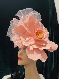 Ready to ship today from Tennessee, USA,  I ship quickly and package safely in boxes. See more beautiful choices at my Etsy Shop at https://www.etsy.com/shop/equineelan        This lightweight and gorgeous hat is a "fascinator hat" that attaches to your head with elastic. The FLOWER is pale true pink.   The Tulle Ribbon is Pale Pink.  The Flower measures a full 12" x 12". The hat is larger with bow and Accent flowers.       This hat attaches with an elastic band that goes behind your ears and un Garden Party Flower Hat With Handmade Flowers, Rose Wedding Fascinator With Handmade Flowers, Pink Feminine Fascinator For Wedding, Whimsical Flower-shaped Fascinator With Handmade Flowers, Rose Fascinator For Kentucky Derby Wedding, Flower Headpieces For Kentucky Derby, Rose Fascinator For Wedding And Kentucky Derby, Pink Headpieces With Handmade Flowers For Royal Ascot, Pink Handmade Flower Headpieces For Royal Ascot