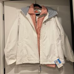 This Ski/Winter Jacket Is 2 In One That Are Detachable And Good Separate Or Together. Brand New Never Used With Tags. From A Pet Free Smoke Free Home. Update: It Was Mishandled During A Move So Tags Are No Longer Present But Remains In Exact Pictured Condition!!! White Windproof Winter Outerwear, White Windproof Outerwear For Fall, White Hooded Windproof Outerwear, White Windproof Outerwear For Cold Weather, White Waterproof Outerwear For Outdoor, Hooded White Outerwear For Outdoor Activities, White Hooded Outerwear For Outdoor Activities, White Outerwear With Detachable Hood For Outdoors, White Waterproof Winter Outerwear