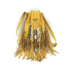 Yellow leather fringe bag native american style medium size Bone bead choker attached as decoration Fully lined inside with one pocket. strap can be adjusted to several lengths. Material: leather, cow bones 8.2 in wide, 11.4 in long. total long include feather fringes 18.9 in aprox 21 cm wide,29 cm long. total long include leather fringes 48 cm aprox Best finishing quality Please note that our products are handmade with some natural materials. For this reason the used materials such as leather a Bohemian Leather Shoulder Bag With Fringe, Bohemian Fringe Hobo Shoulder Bag, Bohemian Brown Bag With Beaded Fringe, Bohemian Festival Bags With Beaded Fringe, Festival Fringe Hobo Shoulder Bag, Bohemian Bags With Beaded Fringe For Everyday Use, Leather Fringe Bag, Bohemian Bag, Boho Purse