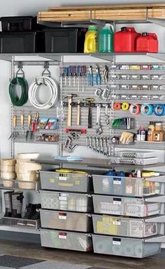 an organized garage storage area with lots of tools