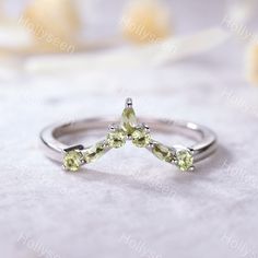 Natural Peridot Curved Wedding Band Engagement Ring The stones of the ring can be replace with other different kinds of gemstone such as morganite, aquamarine, amethyst, citrine, white CZ, pink CZ, etc. If you want to customize your own personal ring, please feel free to contact with me. (925 sterling silver white/yellow/rose gold plated or solid 14k white/yellow/rose gold are available) 14 days money back guarantee. If you want to know the dimension of the curve about the wedding band, just fee Wedding Birthstone Ring In White Gold With Peridot, Green Stackable Rings With Round Cut For Weddings, White Gold Peridot Rings For Wedding, Green Stackable Wedding Birthstone Ring, Wedding Stackable Peridot Rings With Birthstones, Wedding Jewelry With Prong Setting And Peridot, Wedding Jewelry With Prong Set Peridot, Wedding Jewelry With Peridot In Prong Setting, Round Cut Peridot Wedding Jewelry