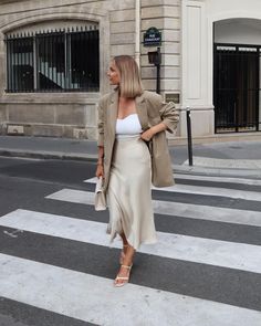 15 Cool Ways To Wear A Midi Skirt This Season Satin Midi Skirt Outfits, Aesthetic Lawyer, Midi Skirt Outfits Summer, Petite Fashion Outfits, Satin Outfit, Satin Skirt Outfit, Spring Skirt Outfits, Slip Dress Outfit, Skirt Outfit Summer