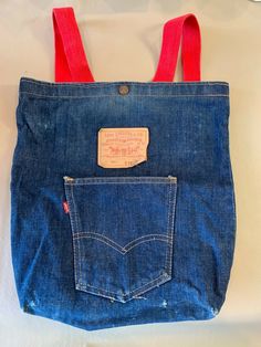 Vintage LEVIS 501 Jean Denim Tote Backpack Bag Purse NOW! Designs San Francisco  Thank you for checking out my listing.  This would make a super cool gift.   This VINTAGE and ORIGINAL Levi's 501 Jean Denim Tote Backpack Bag Purse by NOW! Designs in San Francisco is just used enough to be Super Cool!!!  You will see from the pictures that there is normal vintage wear to the tote on the front and back.    Please feel free to ask any questions.   Comes from a smoke free home.   INTERNATIONAL BUYERS Event Moodboard, Vintage Levis 501, Denim Tote, 501 Jeans, Levi Jeans 501, Levi's 501, Backpack Bag, Clothes To Buy, Levis 501