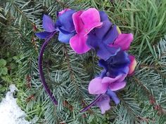 Purple Flower Headband This delightful flower crown features a number of hydrangea flowers in various shades of purple and pinkish purple. Flowers are of assorted textures. Some are velvety, some are matte. Flowers are life sized and made of cloth. All the flowers are clustered on one side and the top of the headband. Headband is a deep purple color. It is made of plastic covered in purple satin. Headband will fit any child over three and most adults. Those with the largest heads or thick hair may find this headband too tight. A great choice for weddings, dress up, or just for fun. Click here for other purple headbands: https://www.etsy.com/shop/FairyFlowerDreams/search?search_query=purple+headband&order=date_desc&view_type=gallery&ref=shop_search E13 Purple Flower Headband, Flower Girl Headpiece, Purple Fairy, Purple Hydrangea, Purple Headbands, Fairy Crown, Satin Headband, Crown Flower, Pinkish Purple