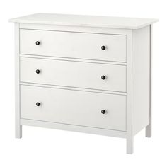 a white dresser with four drawers on top