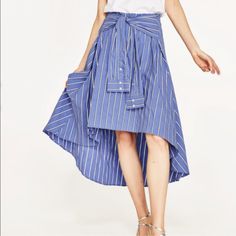 Zara Striped Midi Skirt 4886/083 Limited Edition Shirt-Style Midi Skirt With Sleeves Belt Details. Side Zip New With Tag Composition 72%Cotton 25%Polyamide 3%Elastane Approximate Measurement Laying Flat Waist 13” Front Length 22” Back Length 34” Bin 5 Elegant Blue Maxi Skirt For Day Out, Striped Summer Skirt, Spring Striped Flared Skirt, Zara Flowy Midi Skirt, Zara Relaxed Maxi Skirt For Summer, Spring Striped Skirted Bottoms, Striped Skirted Bottoms For Spring, Chic Blue Maxi Skirt For Day Out, Striped Flared Skirt For Summer