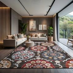 a living room with couches, chairs and rugs in front of large windows