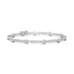 Ten floral station motifs decorate this beautiful stackable bracelet in 14k white gold. They are studded with prong-set round diamonds, forming brilliant clusters.