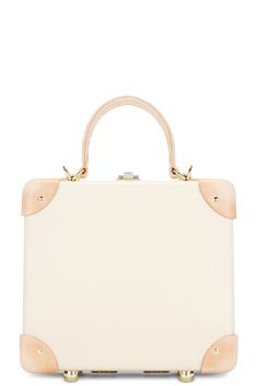 Find GLOBE-TROTTER Safari The London Square Bag 20x20x11cm In Cream on Editorialist. Globe-Trotter Safari The London Square Bag 20x20x11cm in Cream Vulcanized fiberboard case with nickel hardware and leather trims. Made in England. Hinge top with latch closure. One main compartment. Measures approx 8 W x 8 H x 4.3 D Top handle with a 3.5 drop Detachable and adjustable shoulder strap with a 22 drop. GLOB-MY9. GTSAFIN7MUS-2. About the designer: Globe-Trotter is a British Luxury Goods brand established in 1897. Founded by Englishman, David Nelken, in Saxony Germany, the company soon returned to the UK in 1901 where it has remained ever since. Quintessentially British, the brand stands for heritage and craftsmanship. Today, Globe-Trotter products are style icons adopted by purveyors of traditi Quintessentially British, Saxony Germany, London Square, Nickel Hardware, Globe Trotter, Luxury Goods, The London, Good Brands, Square Bag