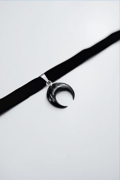 Black velvet choker with lunula moon pendant. Choker width 0 ²⁵/₆₄ "(1 cm) Moon height 0 ²⁵/₃₂ (2 cm) Please add your neck circumference to your order, so choker will surely fit you! Default length is 31 cm (12 ₆₄) + clasp and adjustment chain.  Please feel free to contact is if you have any questions! Follow us on Instagram: @moonphases.worldwide Moon Choker, Goth Choker, Jewelry Goth, Black Velvet Choker, Celestial Necklace, Witchy Jewelry, Pendant Choker, Velvet Choker, Crescent Moon Necklace