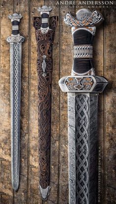 three different types of swords are on display