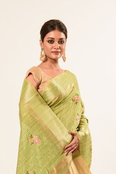 Unveil the sophistication of our Linen Saree in Light Green, adorned with delicate hand stitching that will render an enduring fashion and unparalleled artistry. Slub Silk Dupatta For Spring Weddings, Wedding Dupatta In Slub Silk For Spring, Spring Wedding Dupatta In Slub Silk, Spring Wedding Slub Silk Dupatta, Spring Embroidered Raw Silk Traditional Wear, Elegant Traditional Drape Wear For Spring, Elegant Spring Traditional Wear With Traditional Drape, Spring Wedding Traditional Wear With Cutdana, Elegant Slub Silk Dupatta With Intricate Embroidery