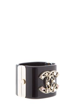 Chanel Black Cuff with Jewel Details; AS-Is Missing 2 stones.Opening: 2.25" x 2.1"Width: 2" Brand = Chanel Color = Black Condition = Gently Loved Item Number: 7650-30 Item ID: 168877 Category: Bracelet Luxury Black Bracelets As Fashion Accessory, Luxury Black Rings Channel Set, Luxury Black Rings With Channel Set, Luxury Black Channel Set Jewelry, Chanel Cuff Bracelet, Chanel Cuff, Ysl Shoes, Black Jewel, Chanel Chanel