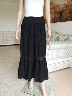 "womens skirt retro skirt goth Clothing 90s black Ruffle skirt Vintage Bohemian skirt goth skirt black skirt L-XL black long skirt height of the woman in the photo - 180 cm Please refer to photos for details of condition. Condition: very good vintage Measurements: Length: 92 cm/36.2 \" Waist 86 cm/34 \" Hips: FREE Size L-XL note The color on the pictures may vary due to monitor settings and light reflections. Ready to ship Please do not hesitate to contact with me for any questions. Thank you fo Long Witchy Skirt, Gothic Long Ruffled Skirt Bottoms, Black Tiered Maxi Skirt With Lining, Bohemian Black Midi Skirt, Black Bohemian Midi Skirt, Black Gothic Long Skirt Bottoms, Gothic Style Tiered Flowy Skirt, Bohemian Black Maxi Skirt, Black Flowy Tiered Maxi Skirt