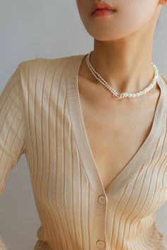 This stunning necklace features an elegant blend of 8mm natural white mother-of-pearl and delicate millet pearls, creating a chic half-and-half design that is both eye-catching and fashionable. With its sophisticated yet modern aesthetic, this piece brings an air of elegance and grace to any outfit. Whether paired with a dress, blazer, or knitwear, it adds a soft and refined touch, making it the perfect accessory for a variety of styles. Metal: Recycled Sterling Silver Plated On Brass Material: Sliver Earrings, Dress Blazer, Half And Half, Beaded Choker Necklace, Tiger Eye Stone, Enamel Earrings, Millet, Stunning Necklace, Metal Earrings