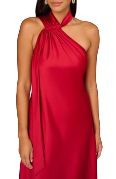 Turn heads in this fiery-hued satin dress designed with a draped-scarf halter neckline and asymmetric hem. 51" length Hidden side-zip closure Halter neck Lined 96% polyester, 4% elastane Dry clean Imported Evening Satin Halter Dress, Satin Halter Dress For Evening, Asymmetrical Satin Gala Dress, Asymmetrical Satin Mini Dress For Evening, Draped Satin Party Dress, Silk Satin Dress For Night Out With Asymmetrical Neckline, Draped Satin Dress For Party, Satin Party Dress With Asymmetrical Neckline And Bias Cut, One Shoulder Dress With Satin Finish And Asymmetrical Neckline