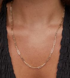 Everyone is looking for the ideal layering chain, and the Courtney Paperclip Necklace in Gold is just that. Its trendy link design complements both delicate necklaces and larger statement pieces perfectly, making chic styling easier than ever. Map Bag, Tailgate Gear, Paperclip Necklace, Delicate Necklaces, Bath And Body Shop, Link Design, Belt Purse, Delicate Necklace, Engraved Rings