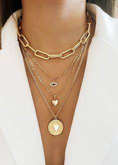 Make a bold fashion statement with our Super Chunky Paperclip Choker. Crafted with oversized links, this edgy and versatile necklace adds a modern twist to any outfit, exuding confidence and style.     14k Gold Filled   Chain length 13”+ 2”   Tarnishing resistant     Hypoallergenic   Please note that chemical and perfume can shorten the life span   Clean your jewelry after each wear with YUMIYU Pouch   Waterproof   Email us for custom orders :)  High-polish, 14k gold finish   Orders ship in 1-3 Spiritual Necklaces, Spiritual Necklace, Always In My Heart, Gold Heart Necklace, Super Chunky, Sell Gold, Evil Eye Pendant, Cheap Jewelry, Evil Eye Necklace