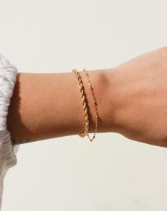 Brighten up your everyday stack with this delicate, gold-filled bracelet. Built to last, this tarnish-resistant bracelet won't lose its gold over time, guaranteeing your look is always polished! • Single Satellite Bracelet• Gold Filled• Chain Length Options: 5"-8"• Bracelet has the option to add a 1" extender to make adjustable Everyday Rose Gold Bracelet Tarnish Resistant, Everyday Rose Gold Tarnish Resistant Bracelet, Everyday Rose Gold-plated Gold Bracelet, Minimalist Gold Charm Bracelet For Friendship, 14k Gold Filled Rose Gold Jubilee Chain Bracelet, Adjustable 14k Gold Everyday Bracelet, Dainty Yellow Gold Chain Bracelet For Layering, Adjustable 14k Gold Bracelet For Everyday, Dainty 14k Gold Filled Tarnish Resistant Bracelet